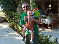 Bill and Davi wearing his Christmas outfit