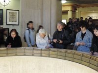 Leonor and Francisco looking at the Foucault Pendulum in the W.M. Keck Foundation Central Rotunda. One of the largest such devices in the world, the fully restored pendulum is actually an elegant scientific instrument which demonstrates the Earth's rotation.