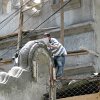 worker scupting a corner