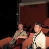 sitting in the theatre