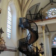 The chapel is known for its unusual helix-shaped spiral staircase (the "Miraculous Stair").  There's a strange story about how it was built