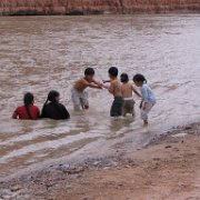 Mexican Hat Navajo children playing in the San Juan river